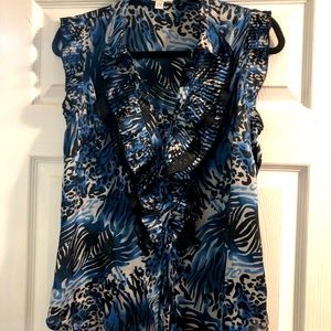 Sleeveless button down blouse with blue leopard design